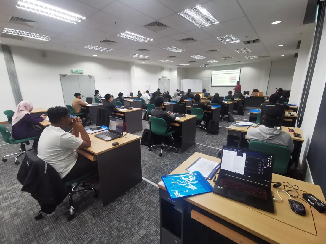 Participants in a hands-on AI and system development class