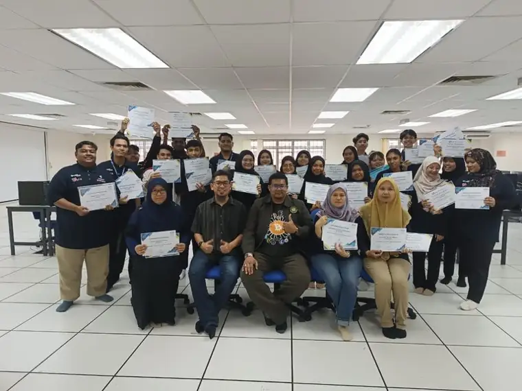 Training cohort with their certificates of completion